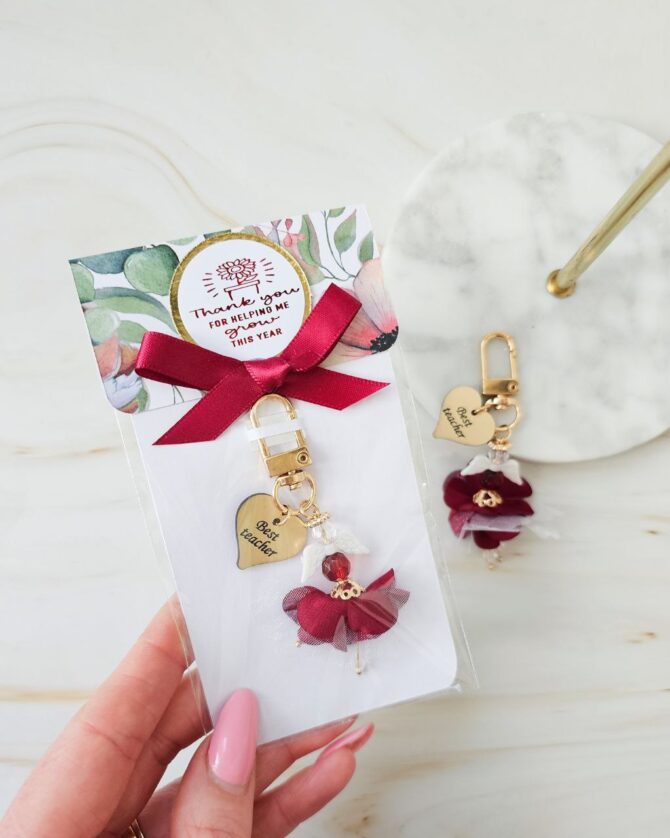 Gold/Burgundy Angel keyring ‘Best teacher ‘