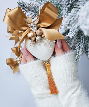 Heart shape bauble with gold ribbon