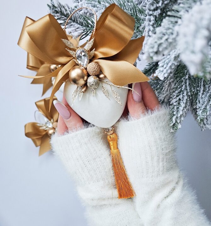 Heart shape bauble with gold ribbon